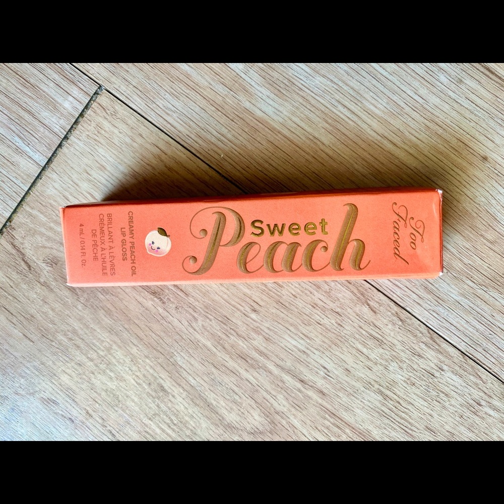 Too faced peachy lip gloss